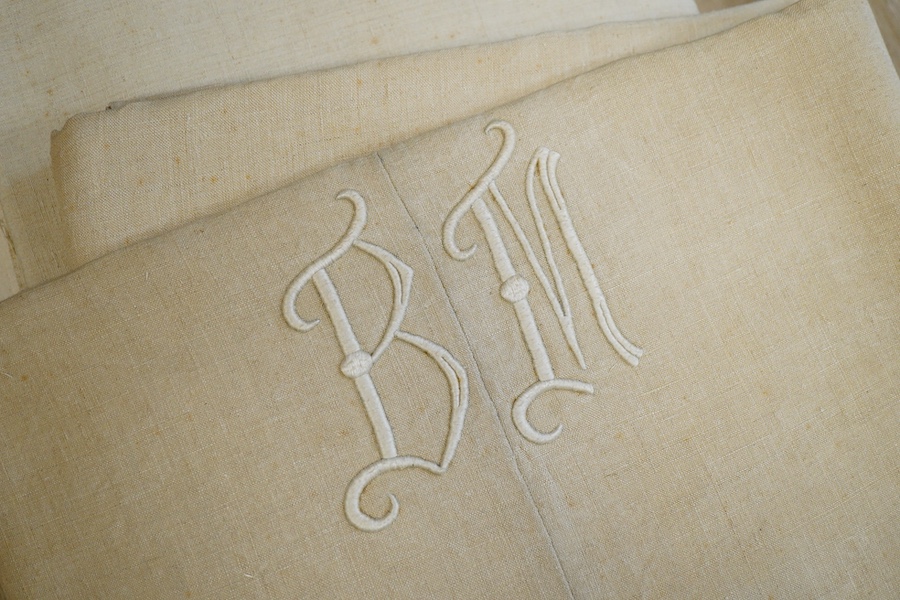 Nine plain coarse linen French provincial sheets and one monogrammed (10)